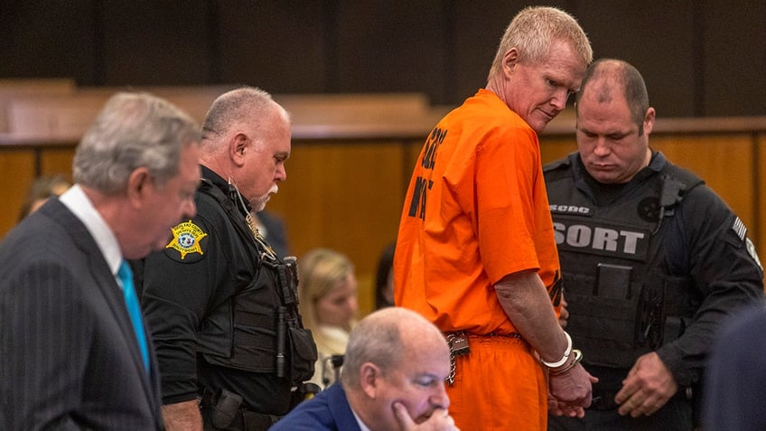 Alex Murdaugh has his handcuffs removed during a jury-tampering hearing at the Richland County Judicial Center