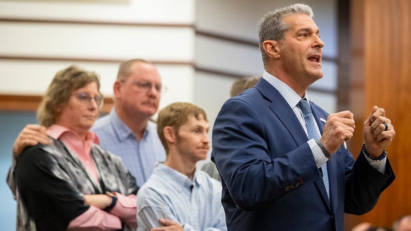 Attorney Eric Blandstanding with members of the Satterfield family, addresses the court during Alex Murdaugh's sentencing