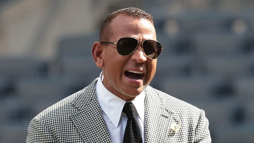 Alex Rodriguez laughs