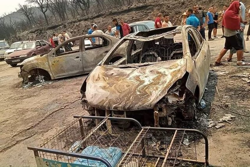 algeria battles raging wildfires that have killed 34