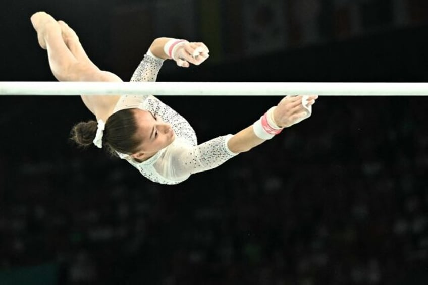 Like a feather: Algeria's Kaylia Nemour soars to uneven bars title