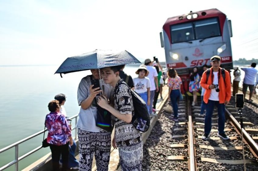 all aboard thailands floating train