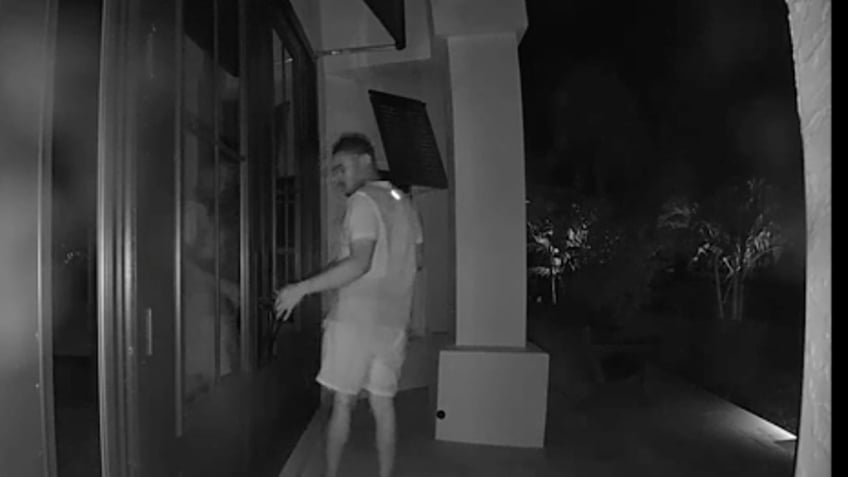 alleged squatter creeps around ritzy neighborhood to scout new home video