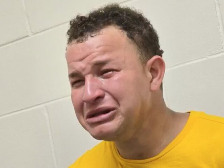 Alleged Tren de Aragua gang member sobs while in police custody.