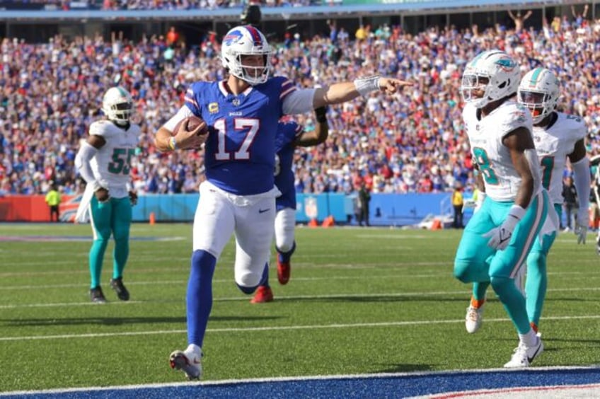 allen delivers five touchdowns as bills beat dolphins