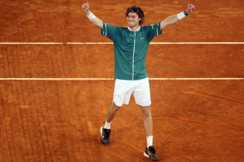 Russia's Andrey Rublev celebrates beating Canada's Felix Auger-Aliassime in the Madrid Ope