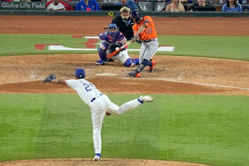 altuve hits go ahead homer in 9th astros take 3 2 lead over rangers in alcs after benches clear