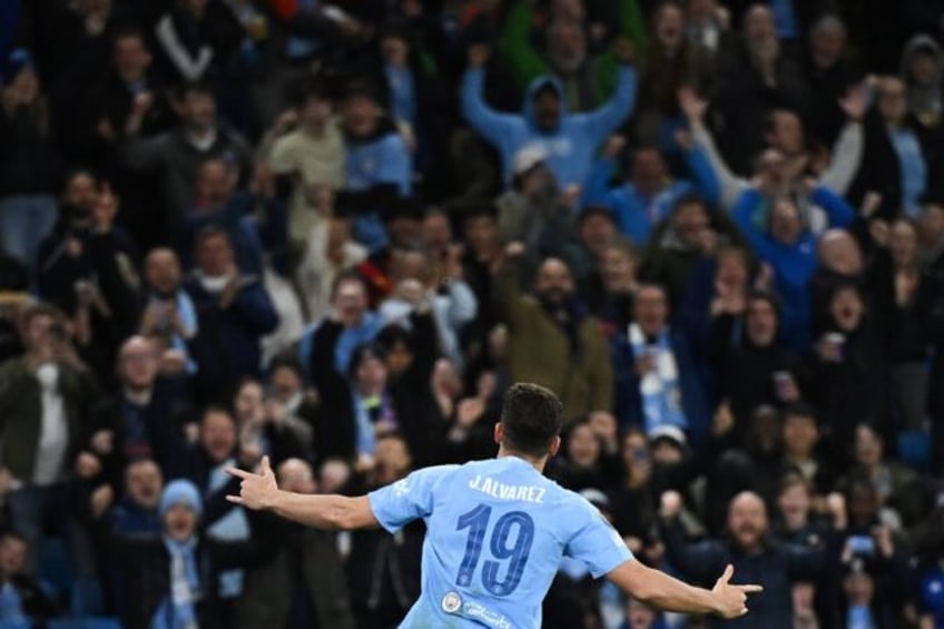 alvarez guides man city to winning champions league start after red star shock