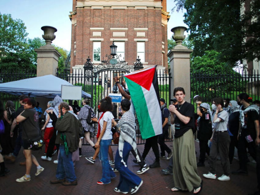Pro-Palestinian protestors march outside Columbia University, in New York City on May 23,