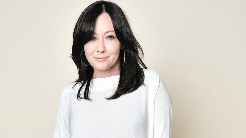 Shannen Doherty wears white top in portrait session