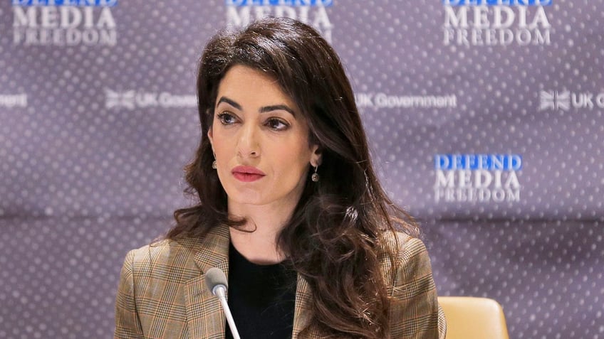 Amal Clooney speaking at an event