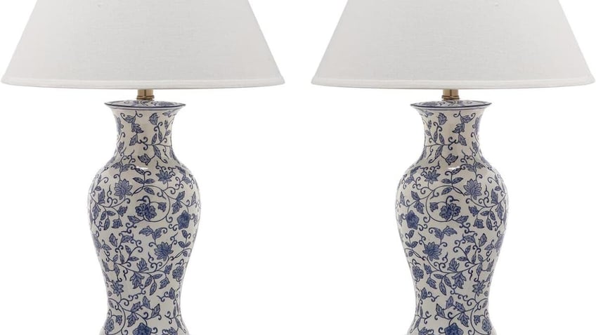 This set of two beautiful table lamps from Safavieh feature a blue and white design of wandering flowers and vines.