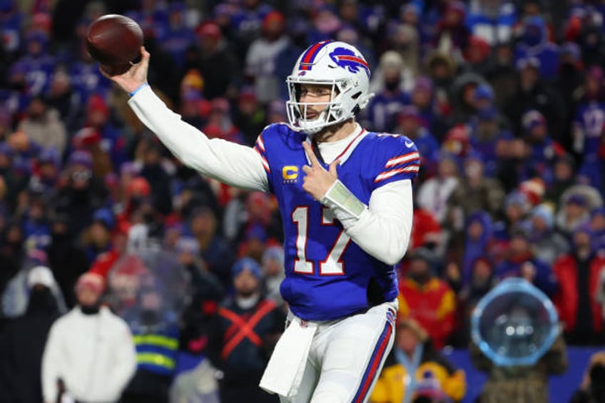 Josh Allen of the Buffalo Bills throws a pass against the Kansas City Chiefs in the AFC Divisional Playoff game at Highmark Stadium on January 21,...