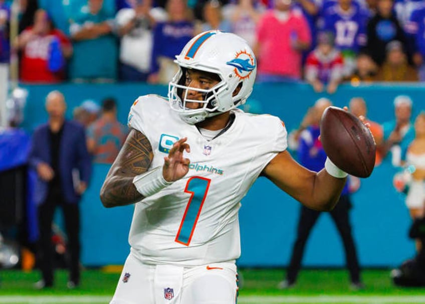 Miami Dolphins quarterback Tua Tagovailoa sets up to pass during first half against the Buffalo Bills at Hard Rock Stadium on Sunday, Jan. 7 in Miami...