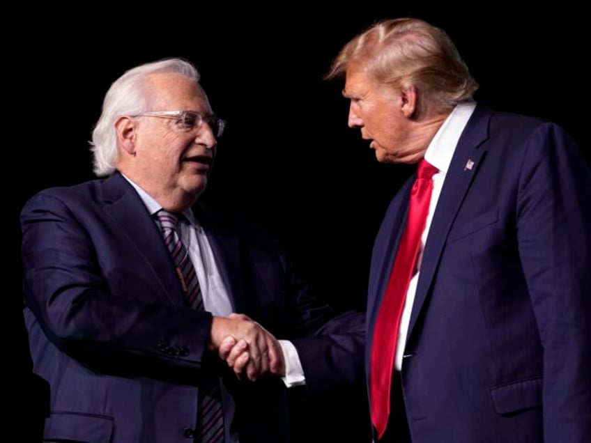 Republican presidential candidate former President Donald Trump greets David Friedman at t