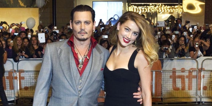 amber heard scores legal win in perjury case after allegedly smuggling her dogs into australia