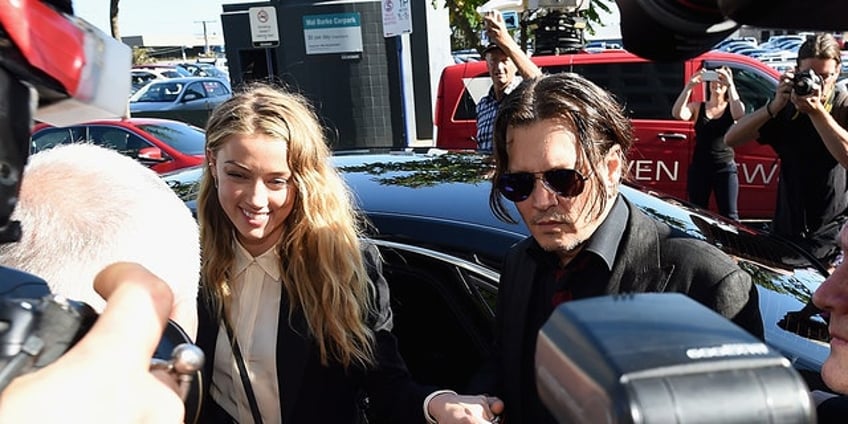 amber heard scores legal win in perjury case after allegedly smuggling her dogs into australia