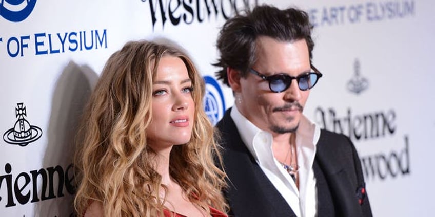 amber heard scores legal win in perjury case after allegedly smuggling her dogs into australia