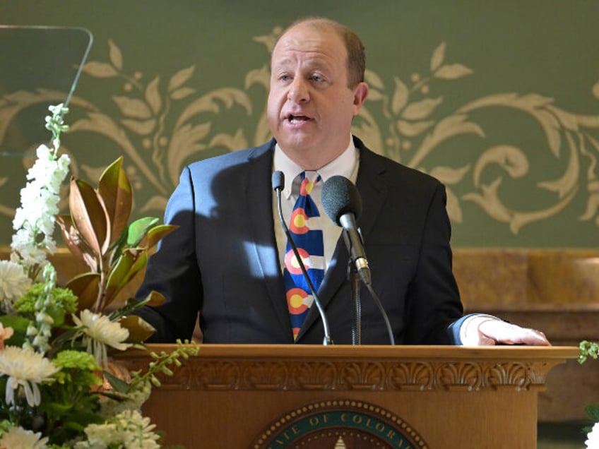 Colorado Gov. Jared Polis delivers his state of the state address in the House chamber of