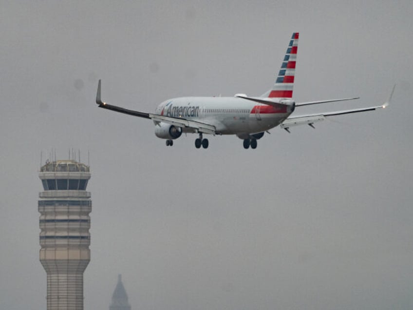WASHINGTON,DC - JANUARY 31: An American Airlines flight lands at Reagan National Airport t