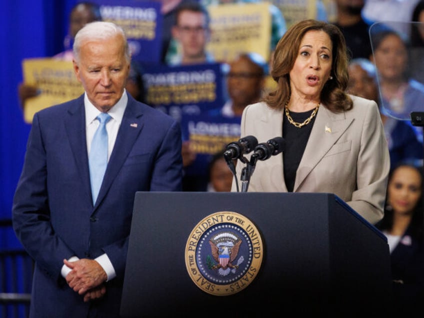 US Vice President Kamala Harris, right, and US President Joe Biden during an event in uppe