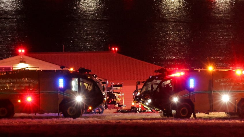 Rescuers work on the Potomac River in Washington DC after a tragic plane crash