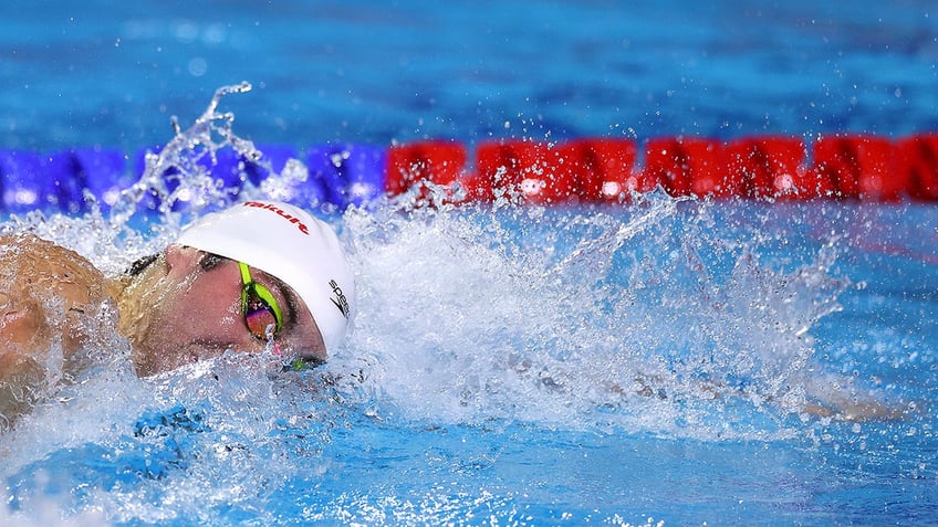 Jack Alexy swims