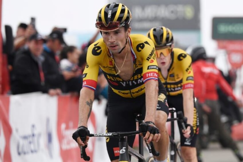 american kuss clings on to vuelta lead on queen stage