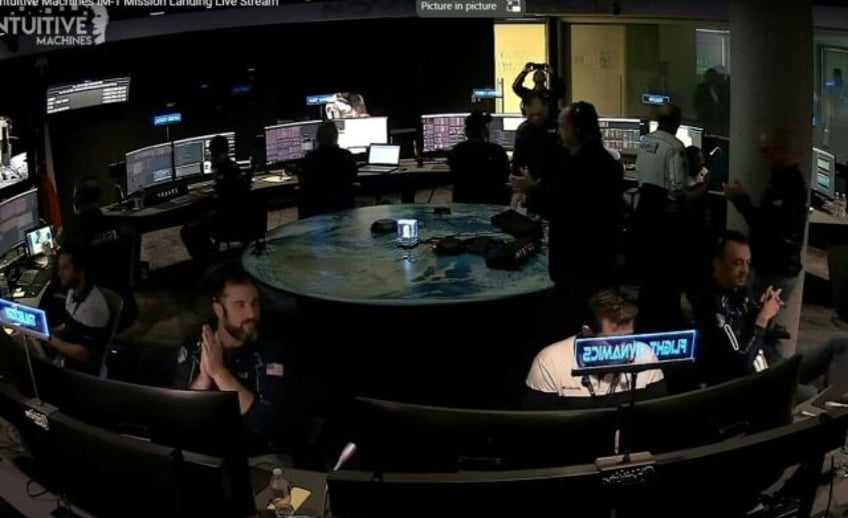 This frame grab from Nasa, shows the control room of Intuitive Machines as the Intuitive M