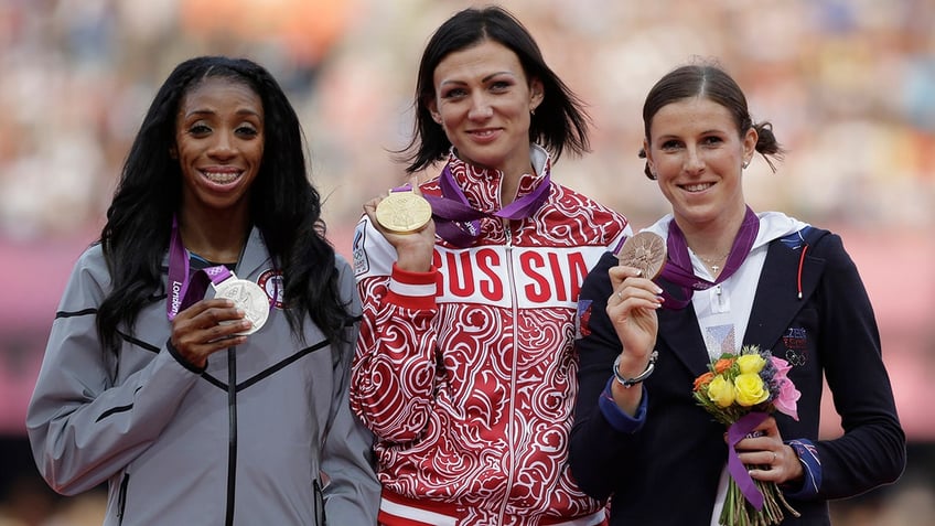 Lashinda Demus and the other medalists