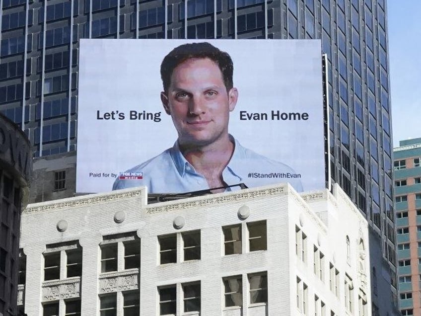 An electronic billboard at New York's Times Square marks the one year anniversary of