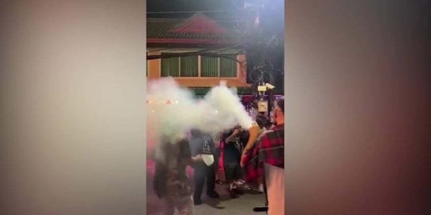 american tourist forced to apologize in thailand after blowing marijuana smoke on crowded street