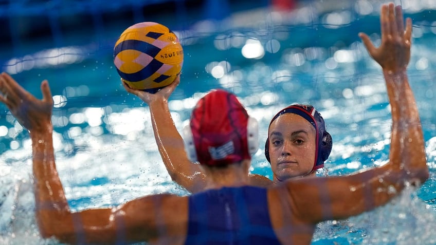 Maggie Steffens looks to score