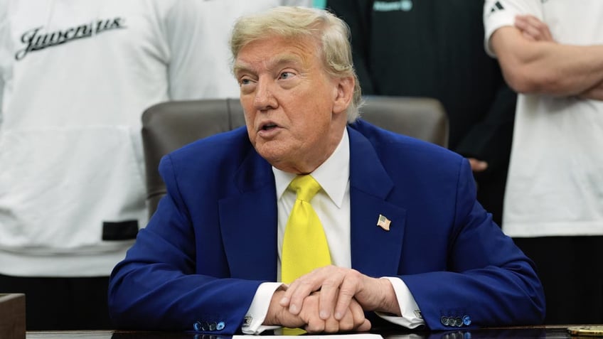 President Donald Trump, in the Oval Office at the White House in Washington, D.C., on June 18, 2025, takes questions from reporters regarding the possibility of launching a military strike on Iran. (AP Photo/Alex Brandon)