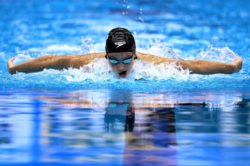 americans finish with flourish as canadian mcintosh wins second swimming gold