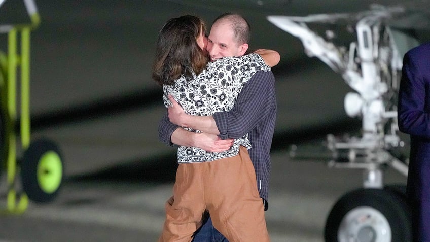 americans freed in historic prisoner swap with russia arrive back on us soil and more top headlines