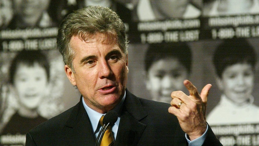 A close-up of John Walsh speaking to the public