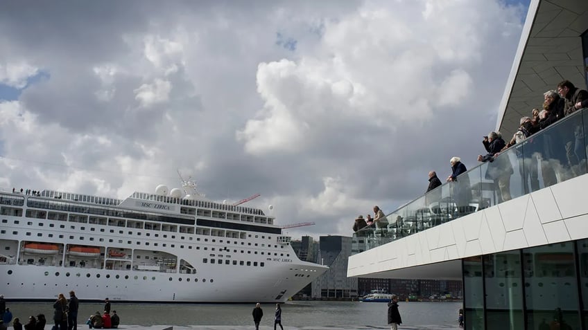 amsterdam moves to ban cruise ships from city center to combat pollution sea of locusts