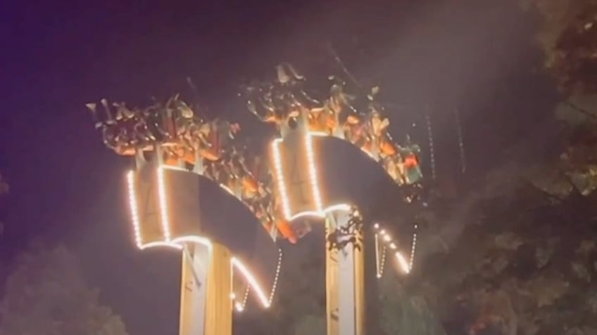 amusement park guests left 75 feet upside down for nearly 30 minutes on lumberjack ride