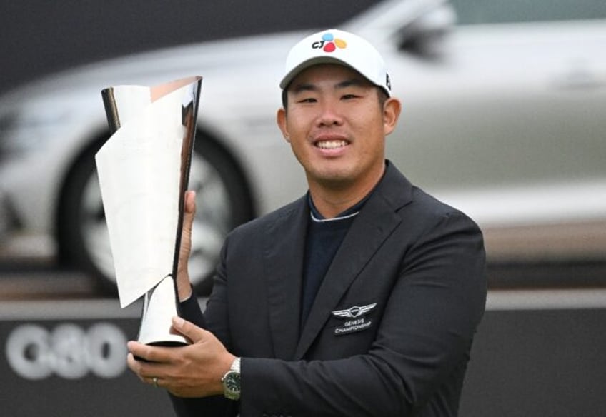 An Byeong-hun celebrates his first DP World Tour win for almost 10 years at the Genesis Ch