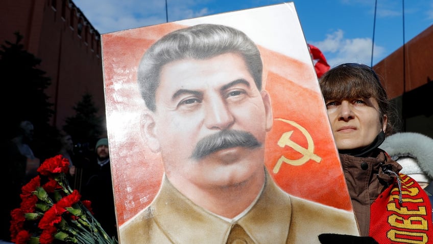 Stalin portrait held up in parade