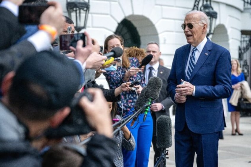 US President Joe Biden speaks to the media outside the White House on April 26, 2024