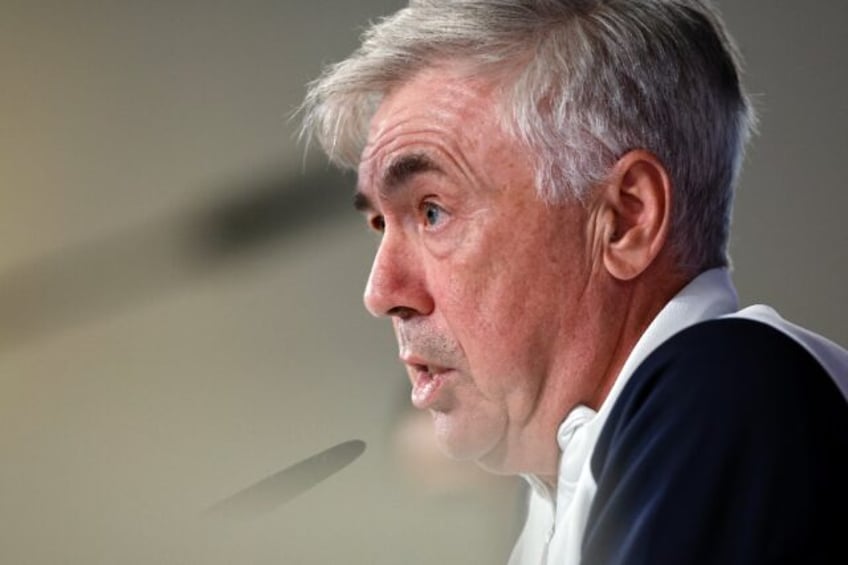 ancelotti backs rival xavi to turn around barca dip