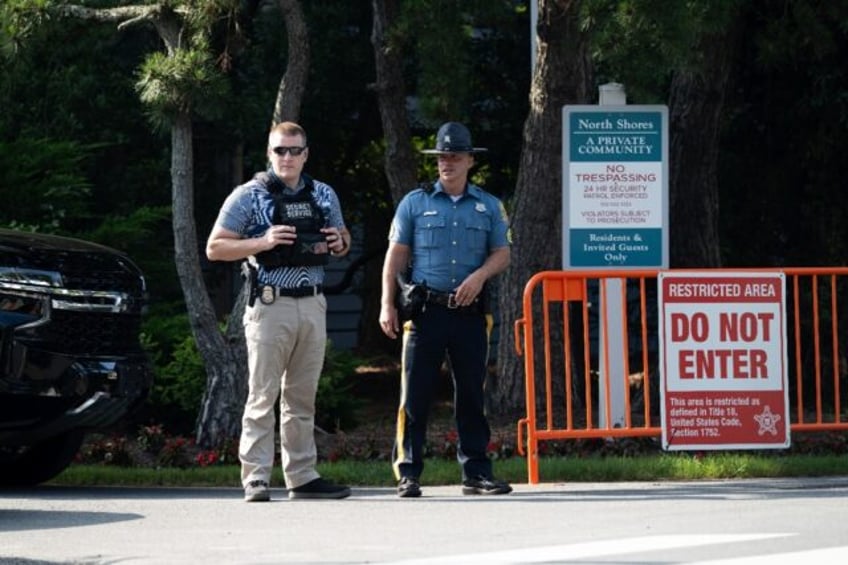 US Secret Service and local police guard a checkpoint near the home of US President Joe Bi