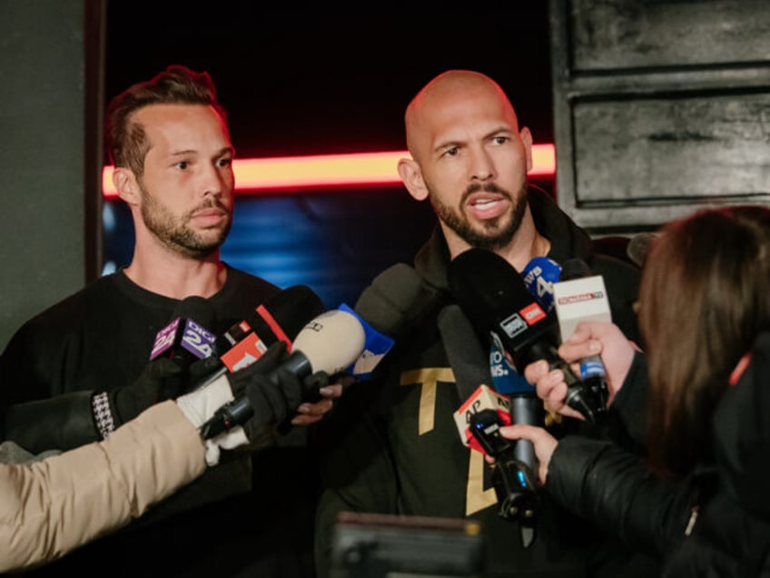 BUCHAREST, ROMANIA - MARCH 23: Andrew Tate and his brother Tristan Tate talk to the media