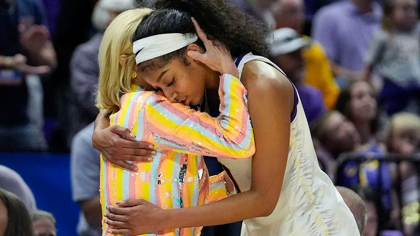 Kim Mulkey and Angel Reese hug