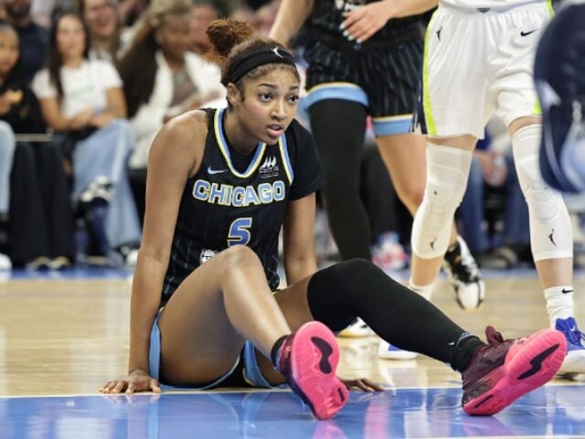 CHICAGO, ILLINOIS - MAY 29: Angel Reese #5 of the Chicago Sky books on during a game again