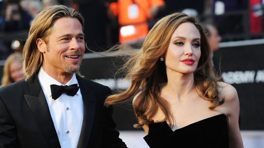 angelina jolie alludes to brad pitt divorce admits family is still finding our footing after split