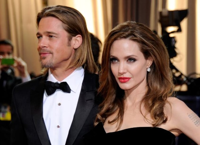 Brad Pitt and Angelina Jolie have signed off on a divorce settlement