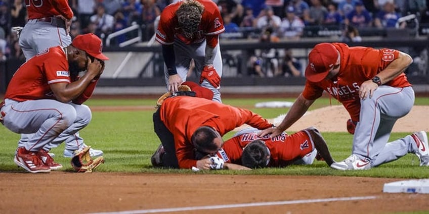 angels chase silseth gets nailed in the back of the head by teammates errant throw